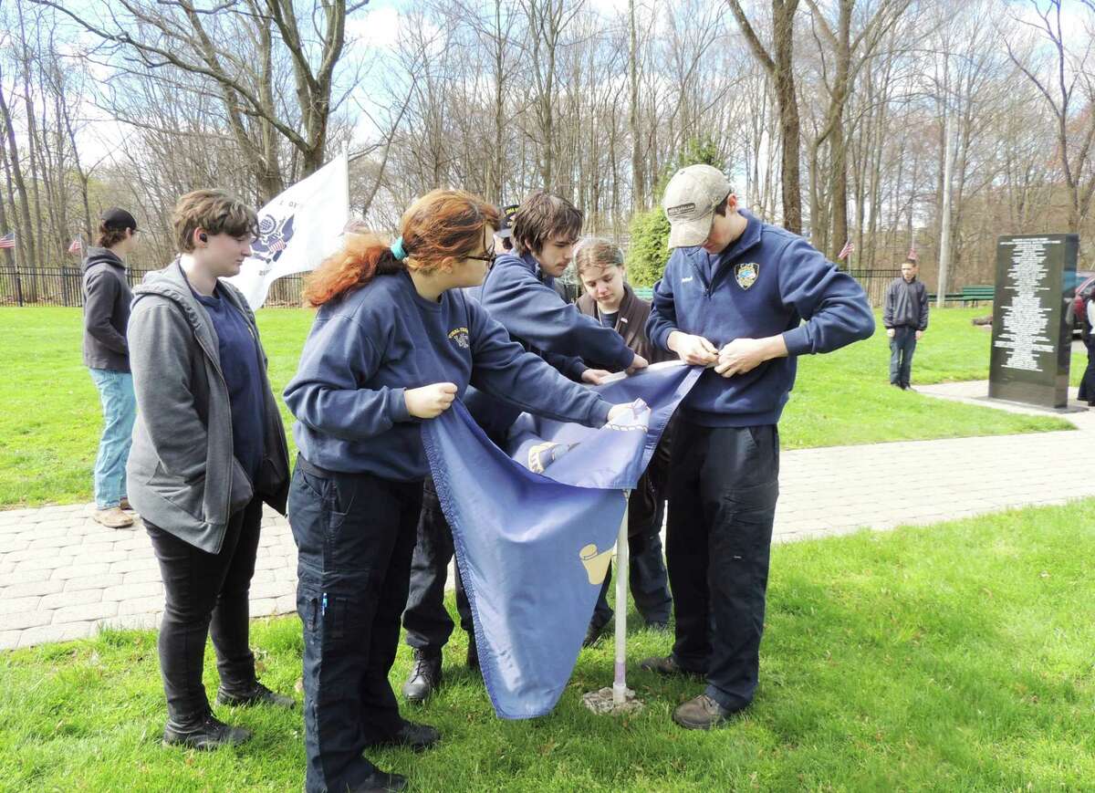 More than 30 sophomore and junior students from Vinal Technical High School in Middletown posted 100 flags at the National Iwo Jima Memorial in Newington April 20.