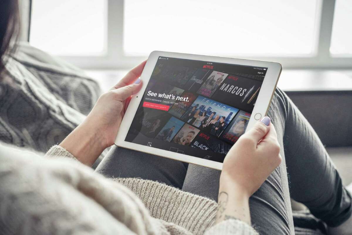 Netflix could ask those who share their passwords to pay more each month.