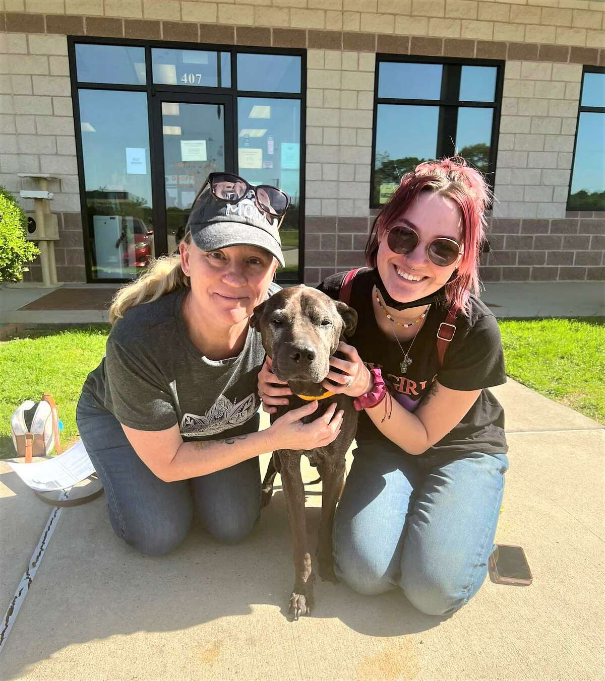 Pictured are Angela Surrett, left, her dog, Vader, and daughter, Marti Surrett, on April 7 in front of the Conroe Animal Shelter. The Surretts had not seen Vader since 2011. The dog was found on the streets of Conroe.
