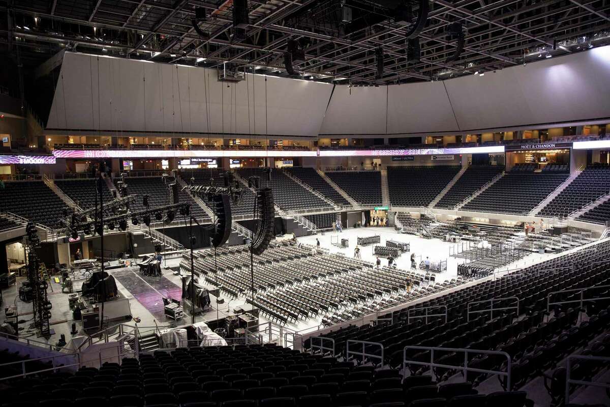 Workers set up for a concert at the Moody Center, a multi-purpose arena in Austin that will be the new home of UT basketball.