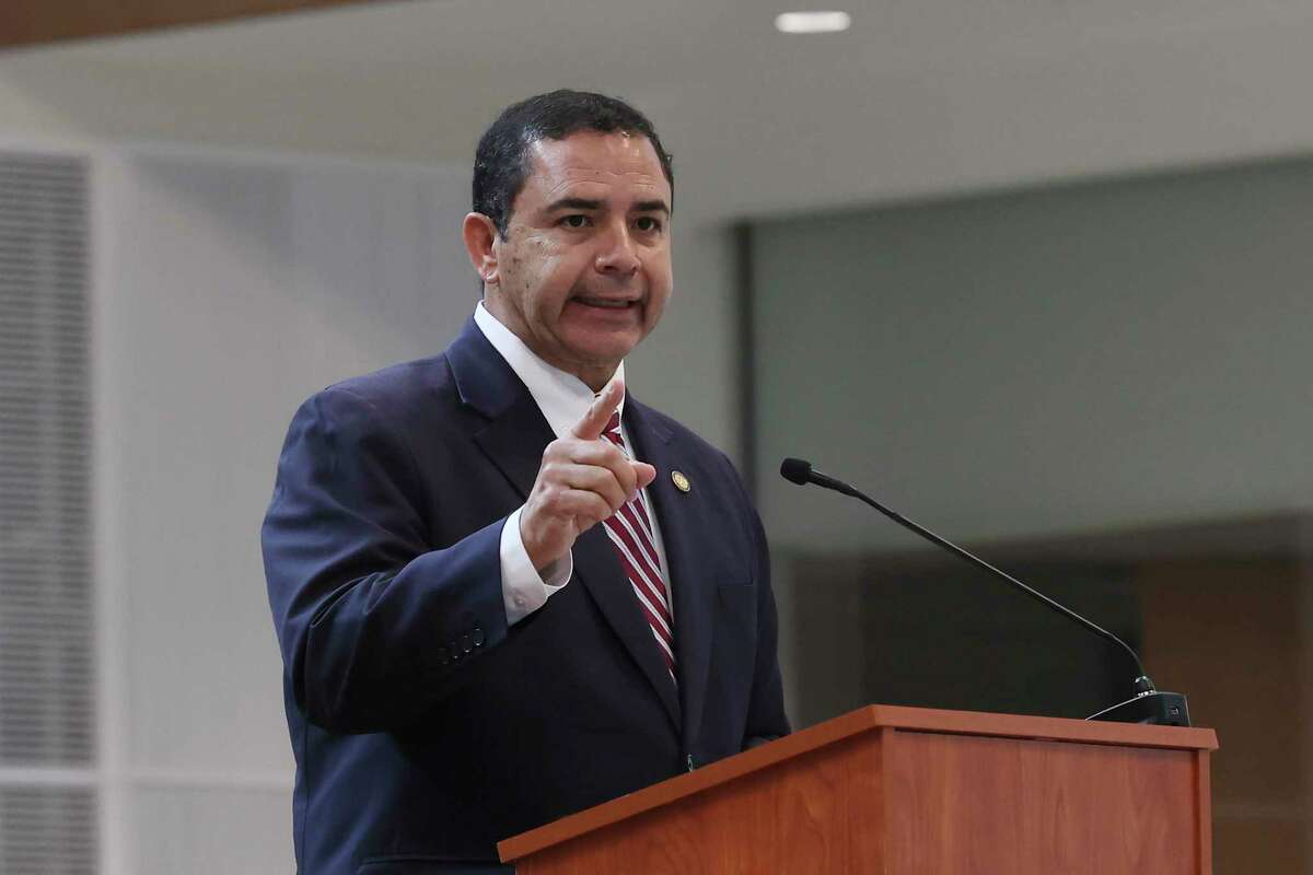U.S. Rep. Henry Cuellar speaks at a dedication ceremony for San Antonio’s new federal courthouse on Wednesday. An FBI search of the congressman’s home and campaign office in January has cast a shadow over his reelection effort.