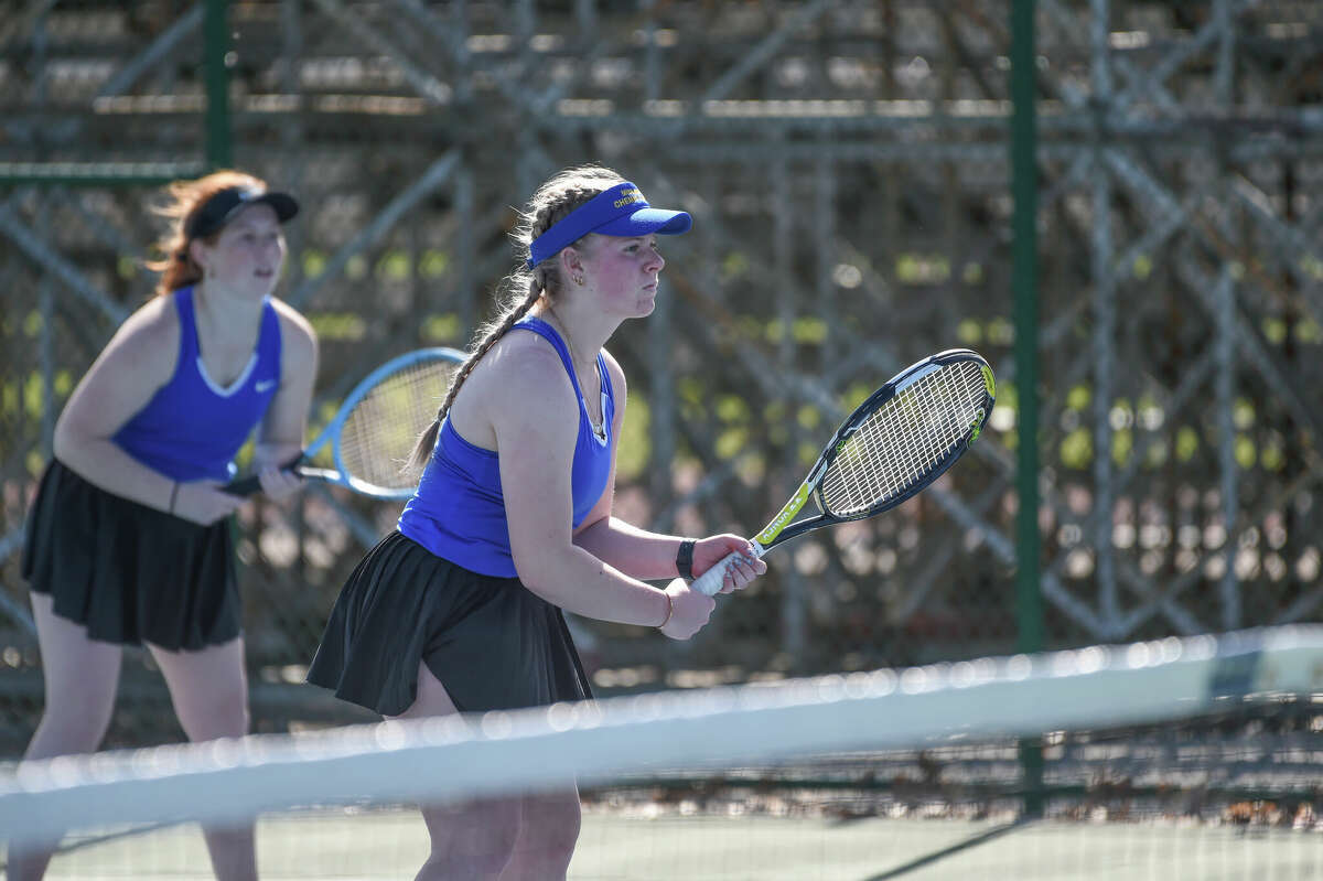 Midland High Doubles players competes in a doubles match against Dow High on April 21, 2022 at Dow High School