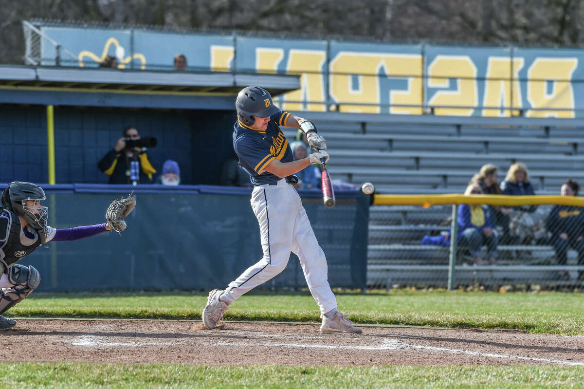 Midland High's Ben Haney takes a swing against Bay City Central on April 21, 2022 at Midland High.