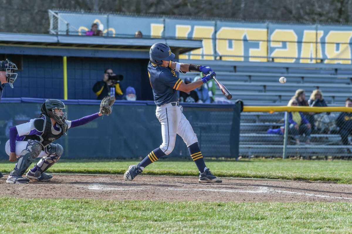 Midland High's Colin Terrill hits in a varsity baseball match up against Bay City Central on April 21, 2022 at Midland High