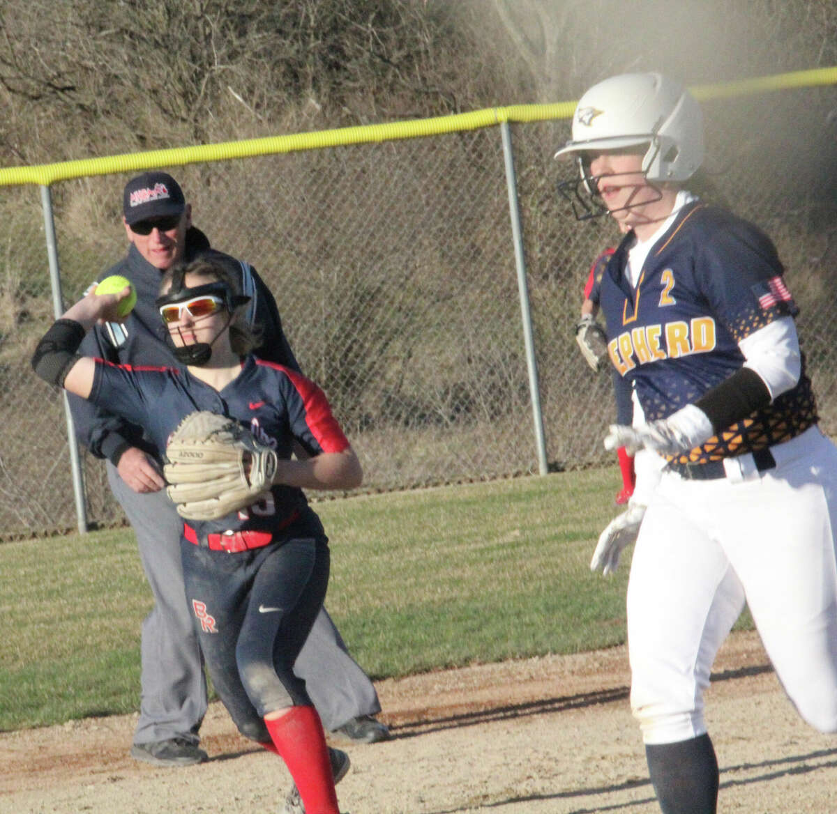 Big Rapids shortstop Zoe Taylor looks to make the play against Shepherd offense on Thursday.