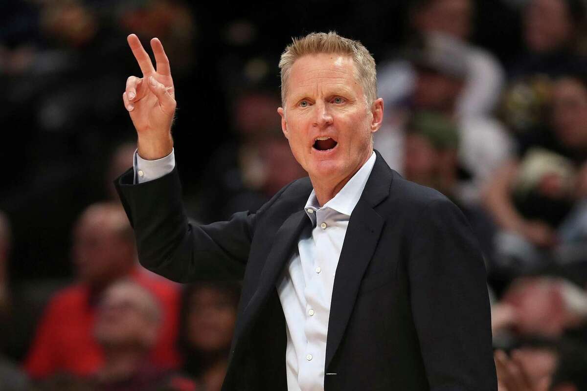 Golden State Warriors head coach Steve Kerr works the sidelines during a 2020 game against the Denver Nuggets at the Pepsi Center in Denver. Back in Denver for Game 3 of the opening round 2022 series against the Nuggets, the Warriors pulled out a 118-113 win to take a commanding 3-0 lead. (Matthew Stockman/Getty Images/TNS)