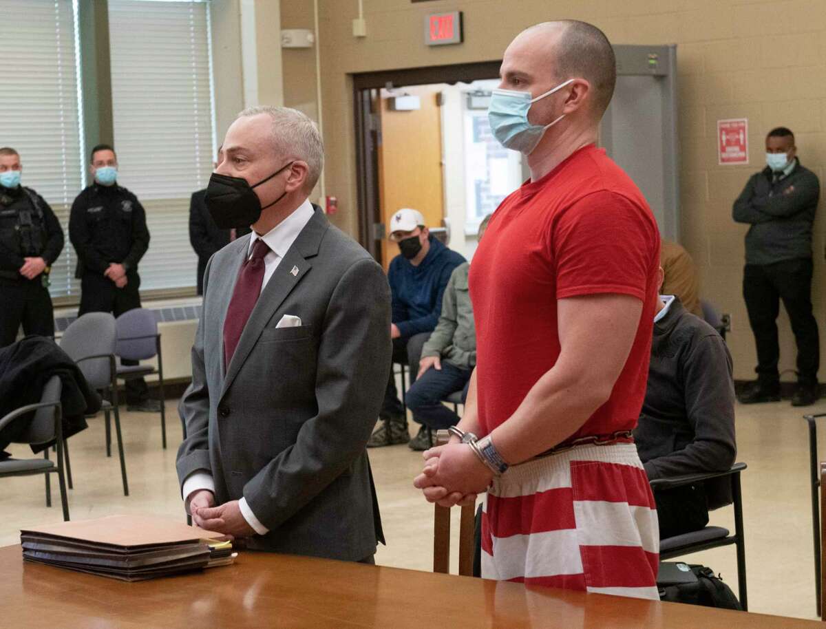 Jacob L. Klein, right, is charged with the murder of St. Peter's Hospital physician assistant Philip L. Rabadi. HE appears for his arraignment with his attorney Mark A. Bederow at New Scotland Town Court on Thursday.