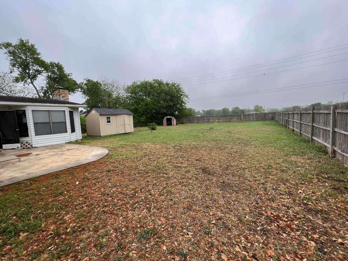 The listing didn't have a size but this backyard is huge.