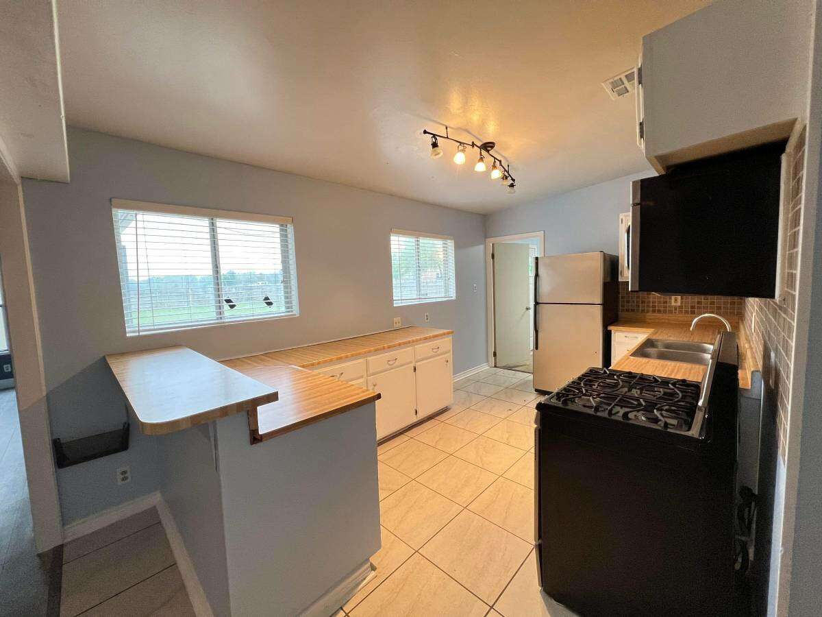 The kitchen comes with new appliances.