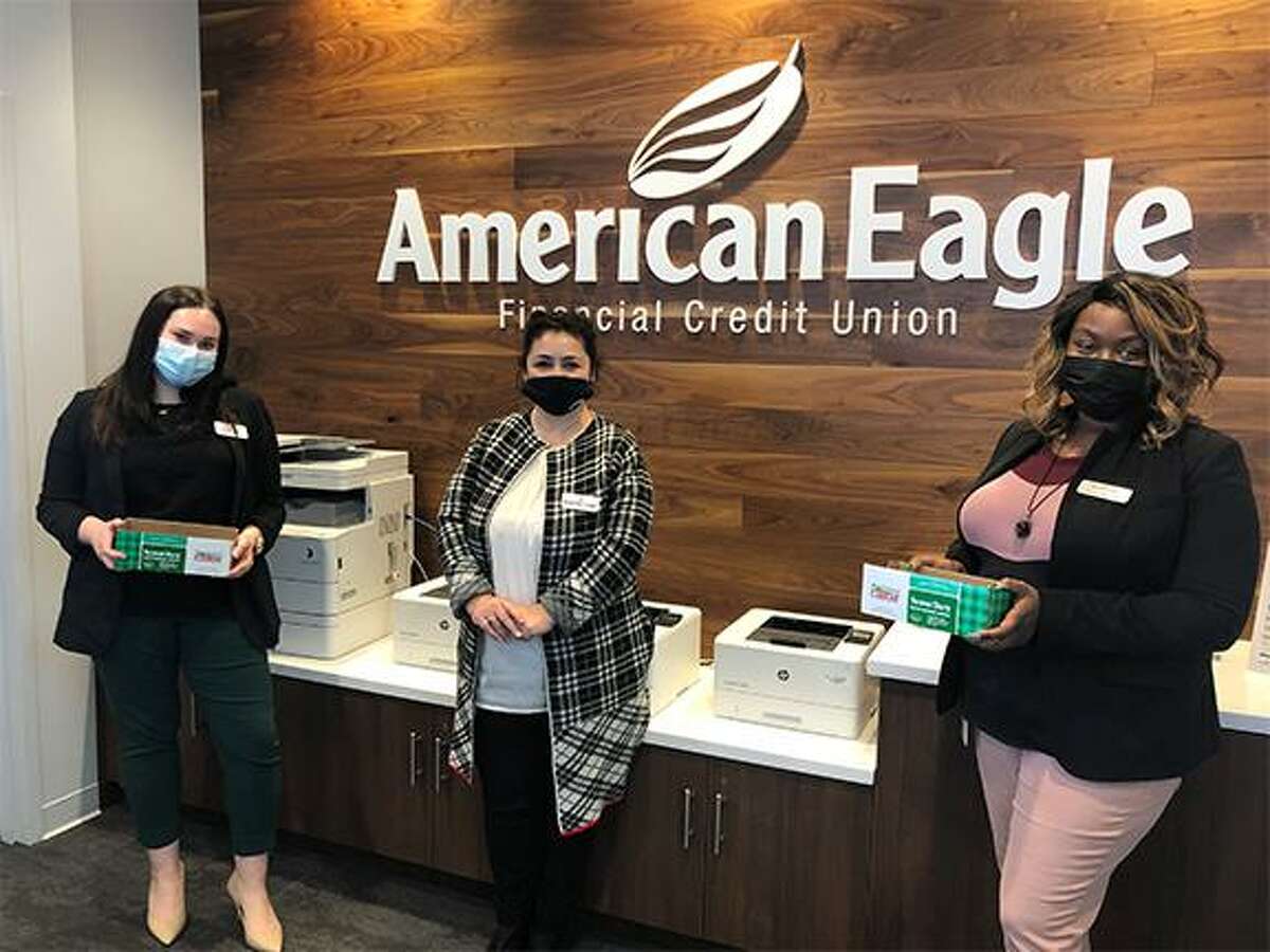 American Eagle Financial Credit Union leaders and employees at AEFCU’s North Haven branch at 84 Washington Ave.