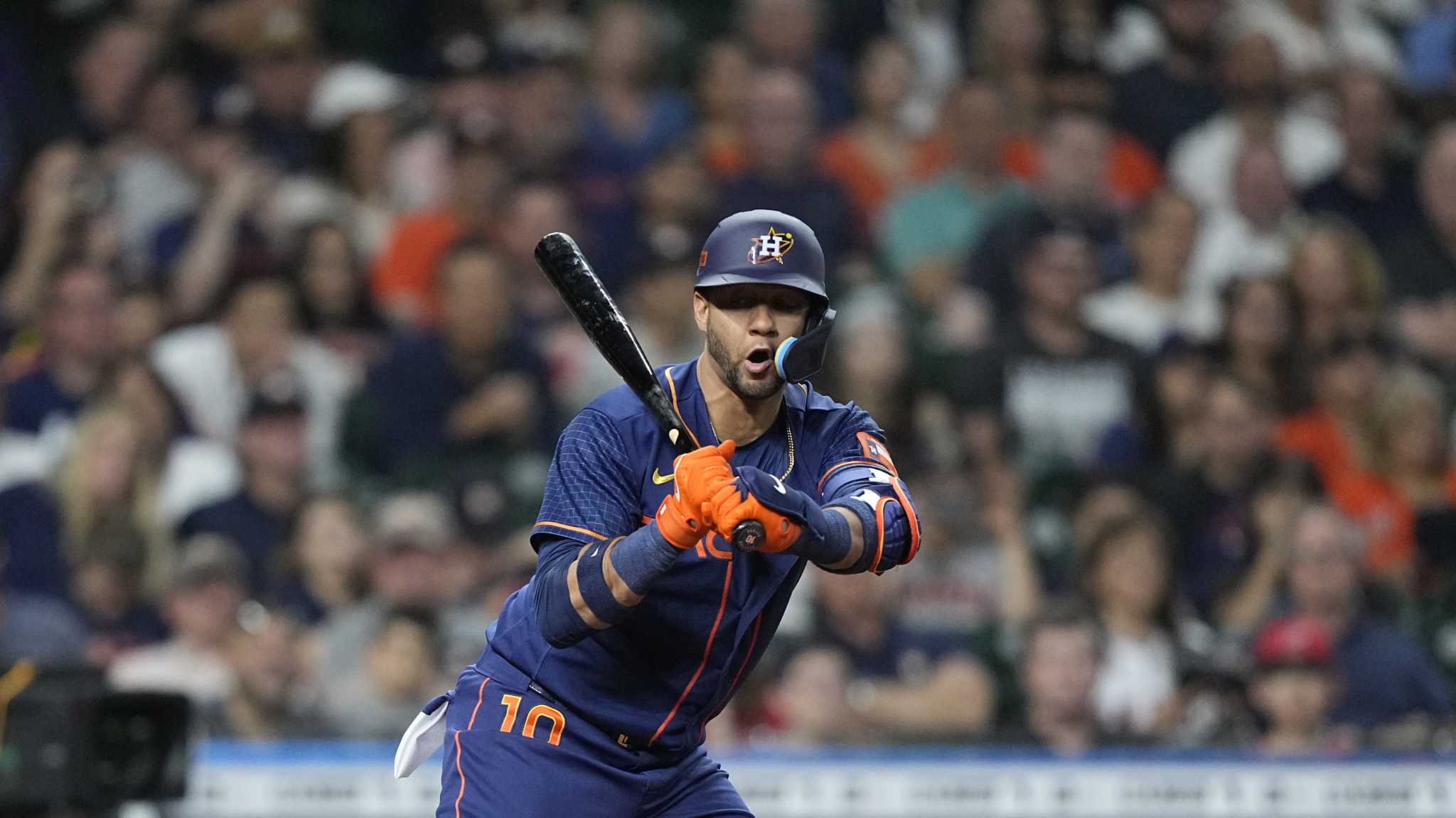 BALTIMORE, MD - August 10: Houston Astros second baseman Jose Altuve (27)  points skyward after scoring during the Houston Astros versus the Baltimore  Orioles on August 10, 2023 at Oriole Park at