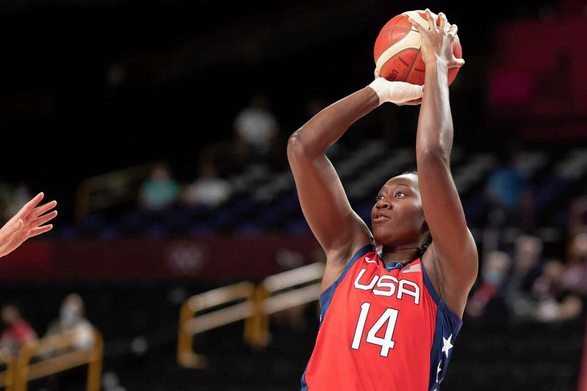 TOKYO, JAPAN August 4: Tina Charles #14 of Team United States shoots during the USA V Australia quarter final match in the basketball competition for women at the Saitama Super Arena during the Tokyo 2020 Summer Olympic Games on August 4, 2021 in Tokyo, Japan. (Photo by Tim Clayton/Corbis via Getty Images)