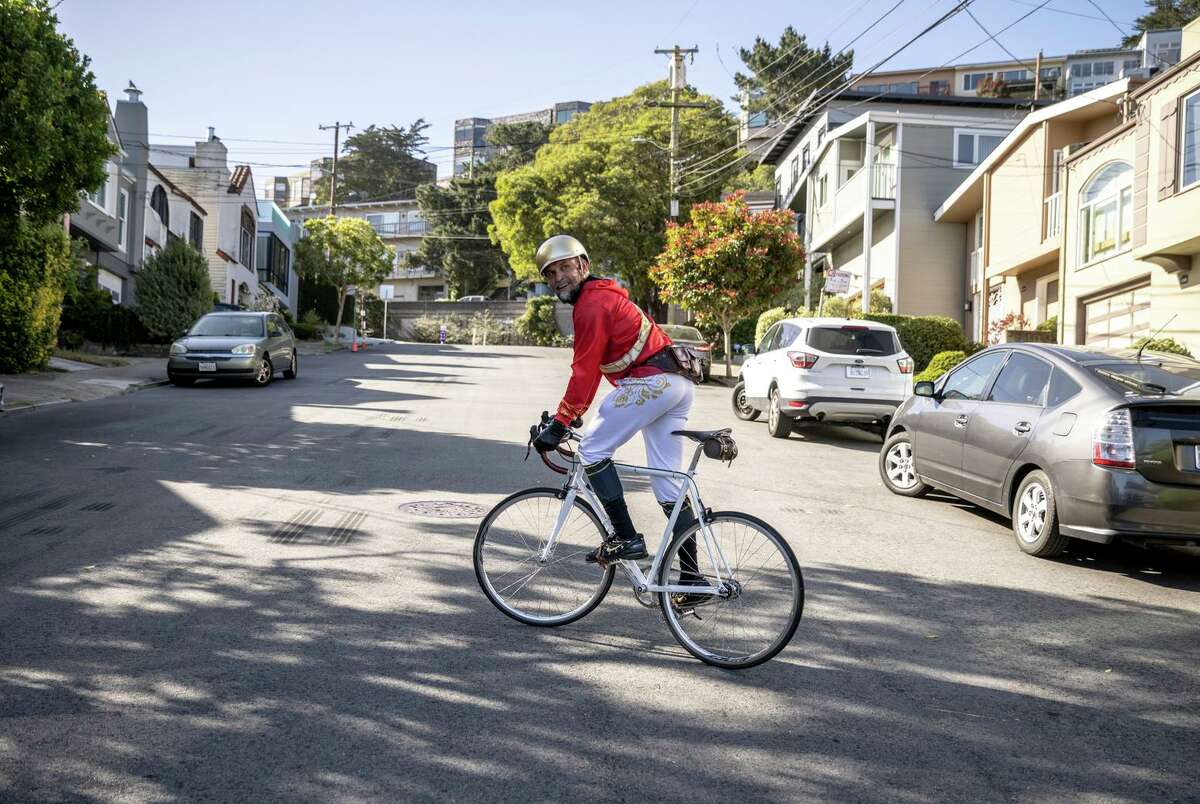 Jakub “Kuba” Mosur zigzags a steep climb on 12th Avenue in San Francisco’s Sunset District as he rides in a route that resembles a great horned owl using the fitness tracking app Strava.