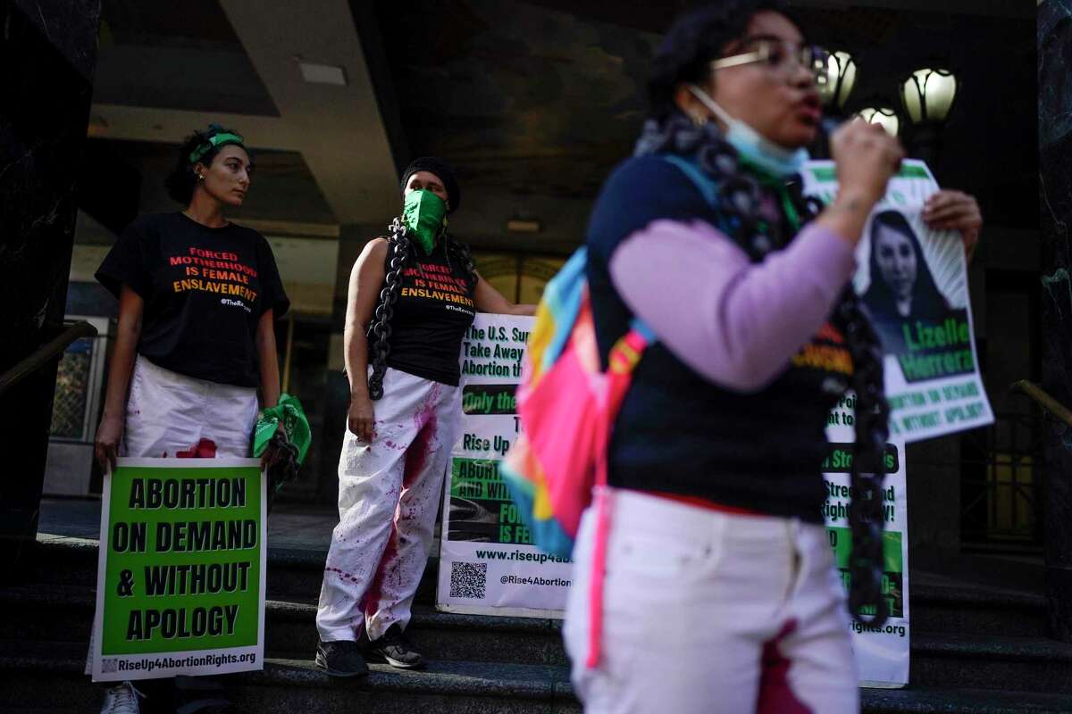 Women in Los Angeles rally in support of Rio Grande resident Lizelle Herrera, after she was incorrectly charged with murder for a self-induced abortion.