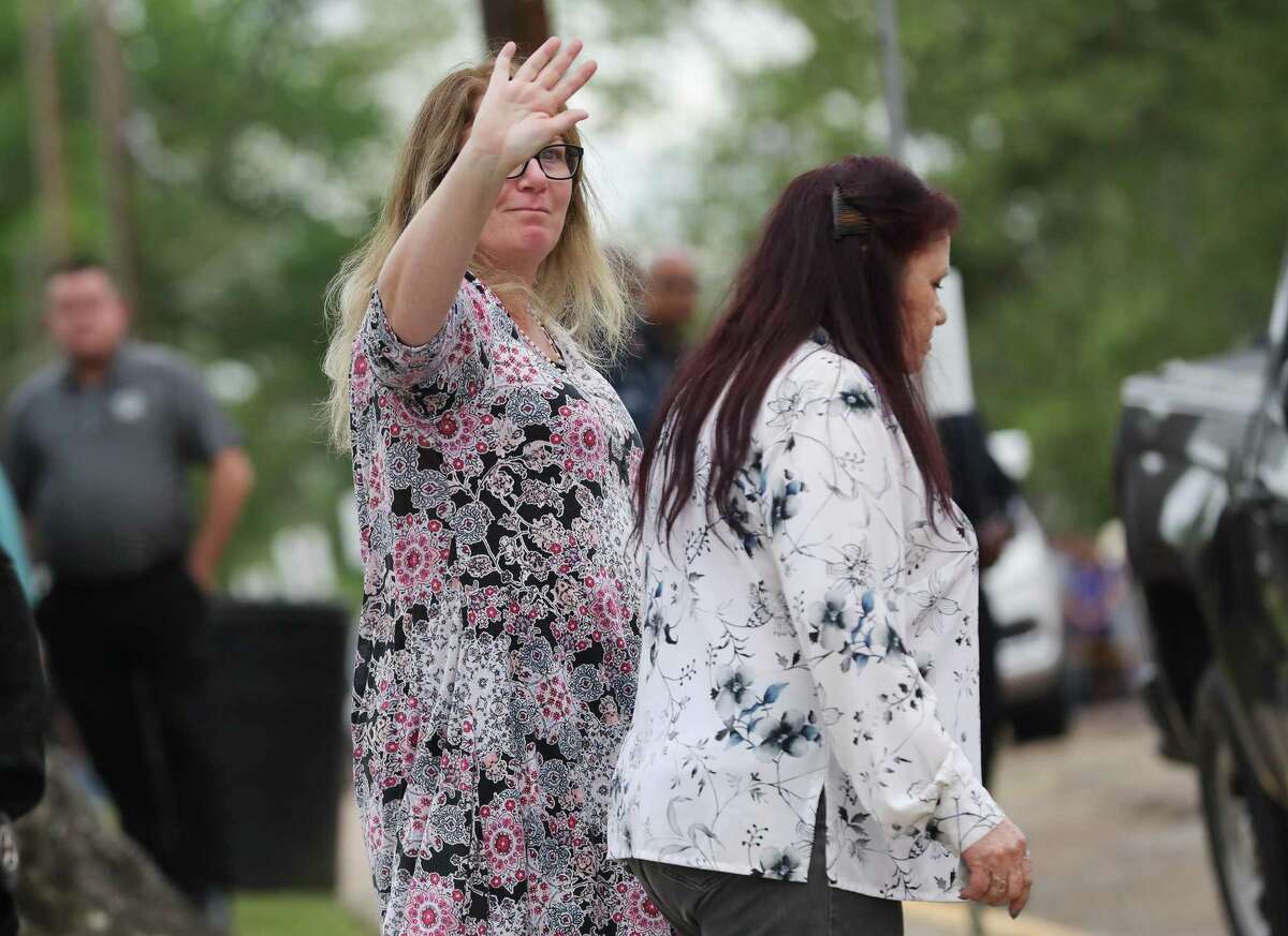 Barbara Laubenthal, waves to anti-death penalty protestors, as she makes her way to witness the execution of Carl Wayne Buntion in Huntsville on Thursday, April 21, 2022.