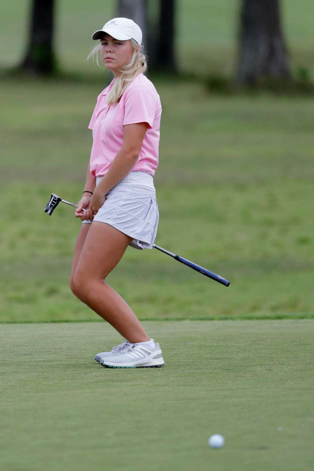 Melanie Maier of George Ranch reacts to missing her putt on the 9th hole during the second round of the Region III-6A Girls Golf Tournament held at Eagle Pointe Golf ClubTuesday, Apr. 19, 2022 in Mont Belvieu, TX.