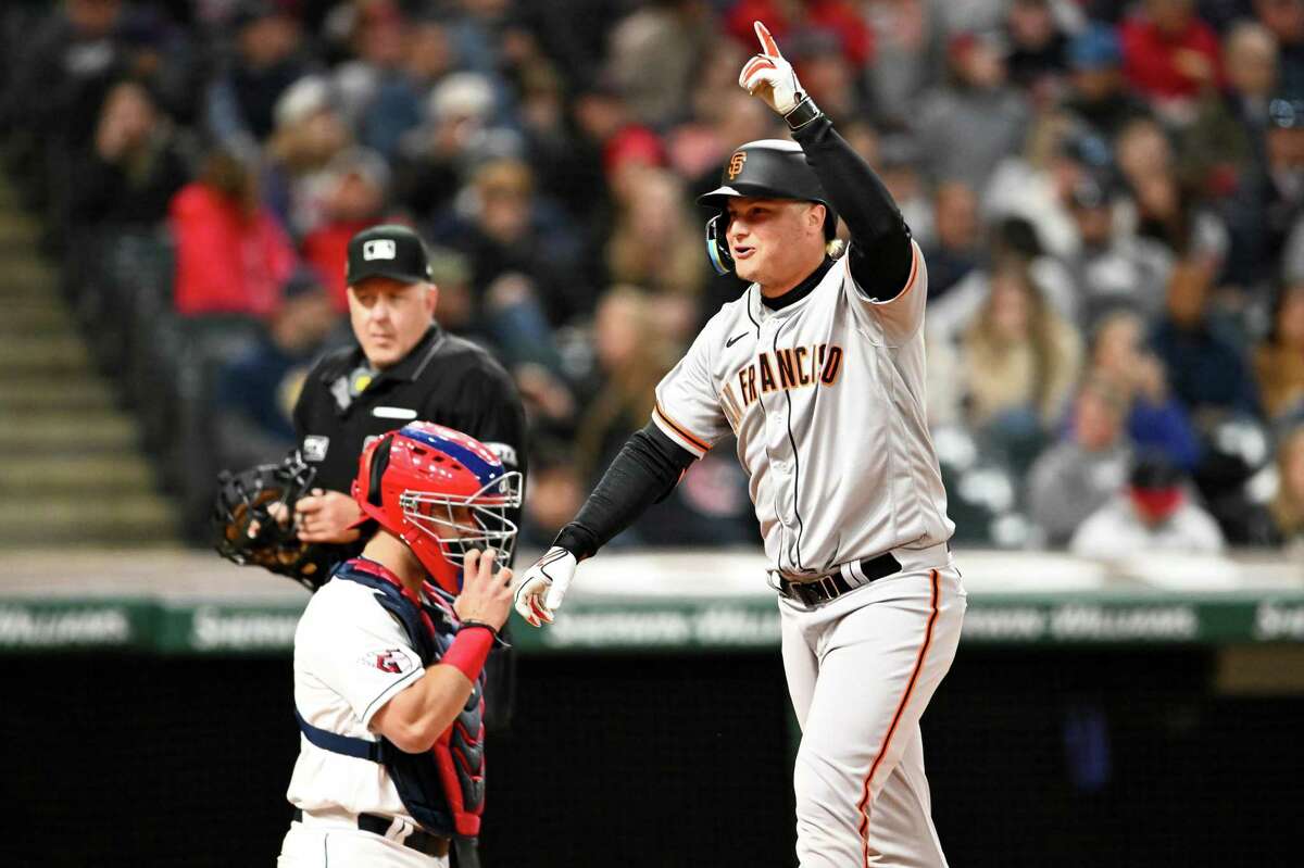 CLEVELAND, OHIO - APRIL 15: Joc Pederson #23 of the San Francisco Giants celebrates after hitting a solo homer during the sixth inning of the home opener against the Cleveland Guardians at Progressive Field on April 15, 2022 in Cleveland, Ohio. All players are wearing the number 42 in honor of Jackie Robinson Day. (Photo by Jason Miller/Getty Images)