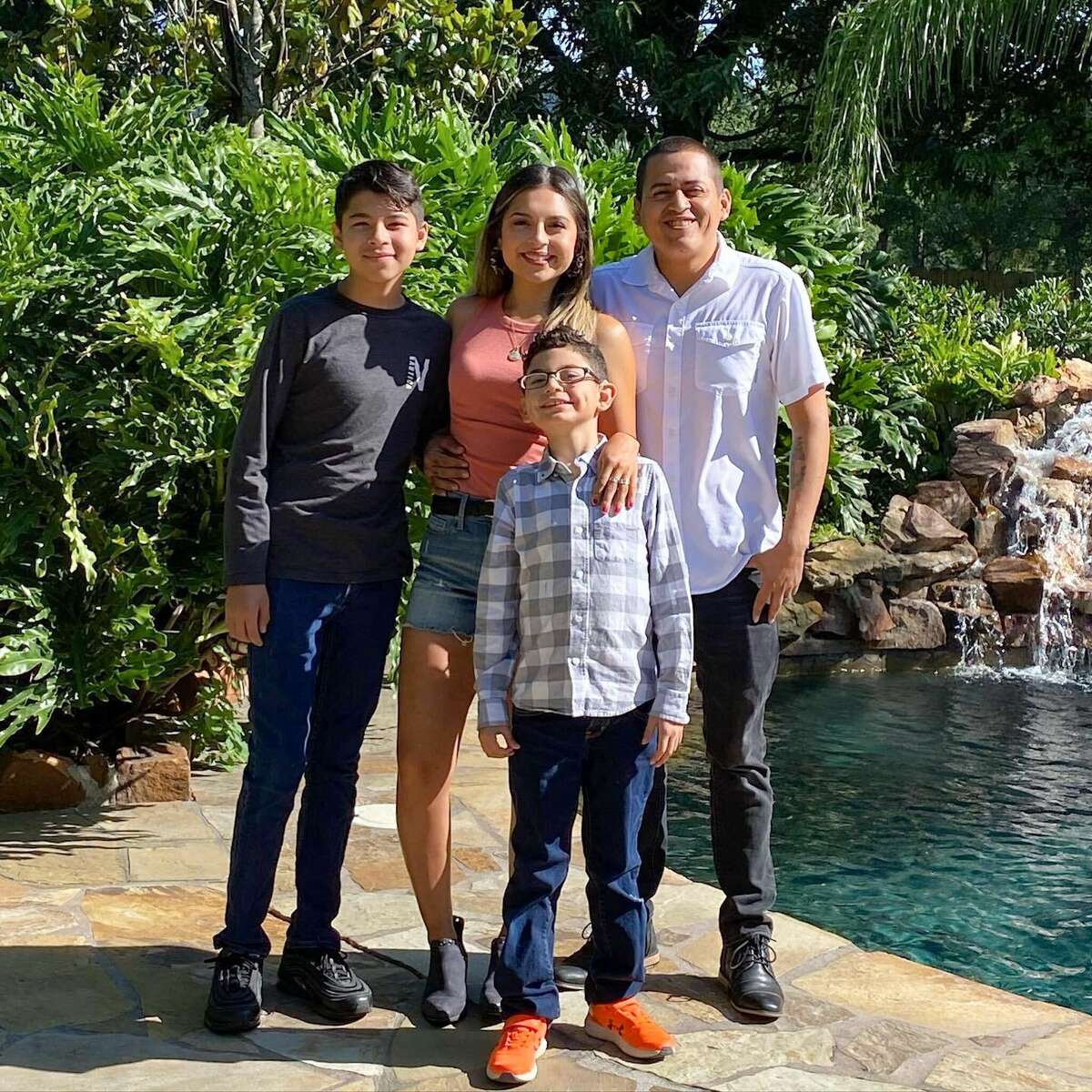 Bianca Sandoval with her husband Marco and their two sons. 
