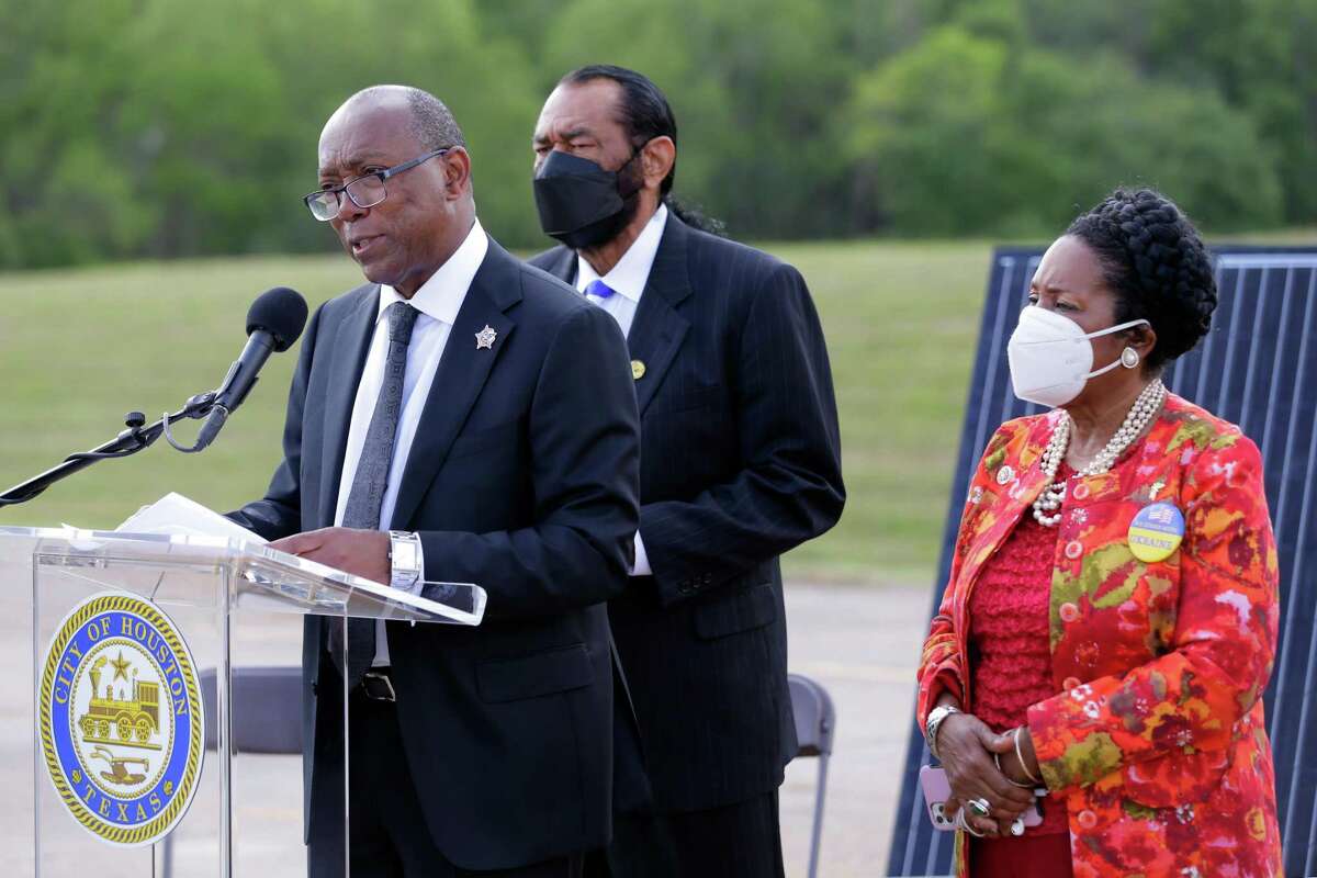 Houston mayor Sylvester Turner gives remarks in front of Rep. Al Green and Sheila Jackson Lee during a press conference at the old Sunnyside landfill site to announce plans to convert it into one of the biggest solar farms in the country Friday, April 22, 2022 in Houston, Texas.