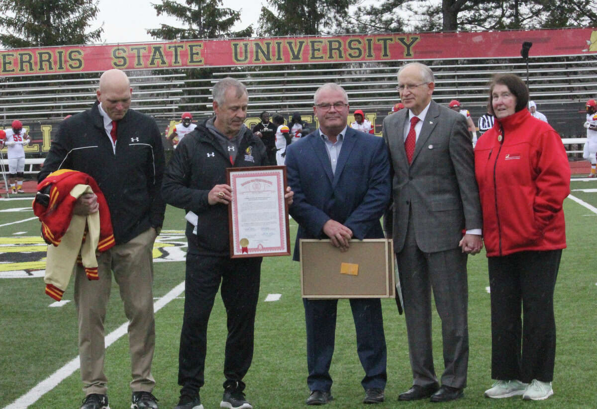 Participating in Friday's presentation of the state of Michigan's congratulaions for Ferris State for its national football title were, from left, athletic director Steve Brockelbank, football coach Tony Annese, state senator Rick Outman, Ferris president David Eisler and his wife Patsy Eisler.