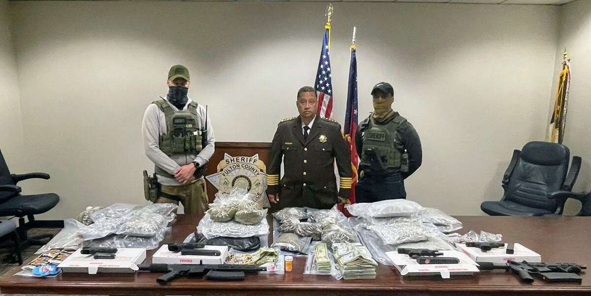 Fulton County sheriff’s officials in Georgia said deputies seized “a stash of narcotics and firearms,” including 34 pounds of what they believed was marijuana, ammunition, prescription pills, as well as jewelry and $140,000 in cash. Jamariea Newt, 28, a fugitive out of San Francisco, was one of four people arrested Thursday in the Atlanta operation, San Francisco police said.