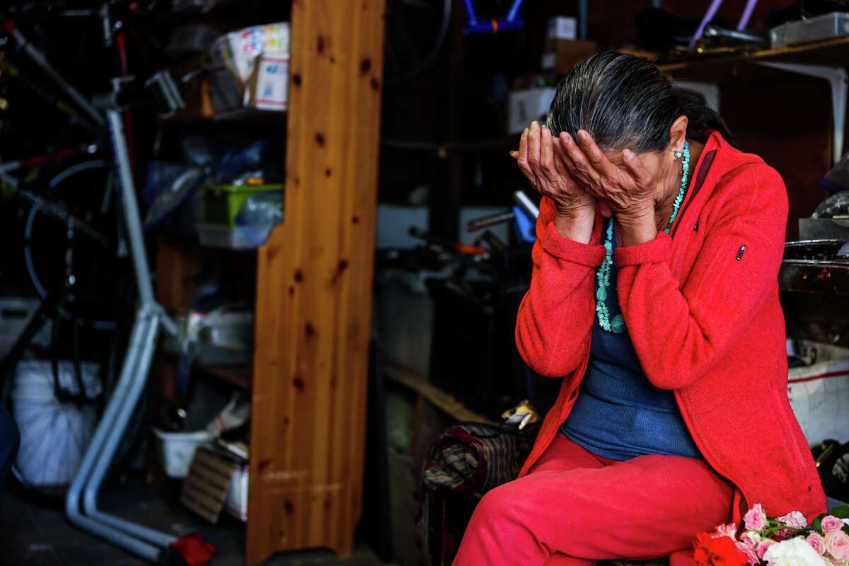 Denhi Donis, affectionately known as “the flower lady” for her colorful offerings to neighbors in Bernal Heights, breaks down as she discusses an eviction notice she received. Donis is organizing a protest in late April to contest the eviction.