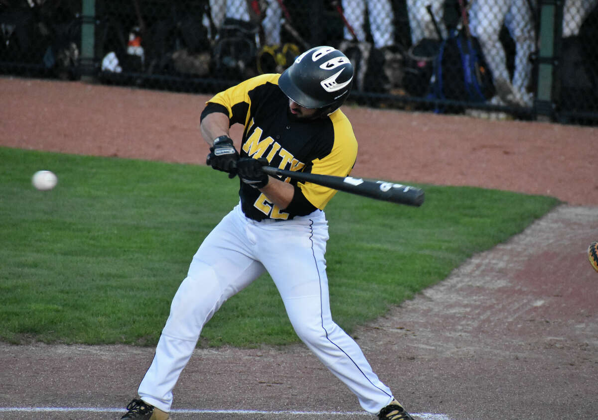 Amity's Evan Talnose takes a swing during a baseball game between Amity and Xavier at Palmer Field, Middletown on Friday, April 22, 2022.