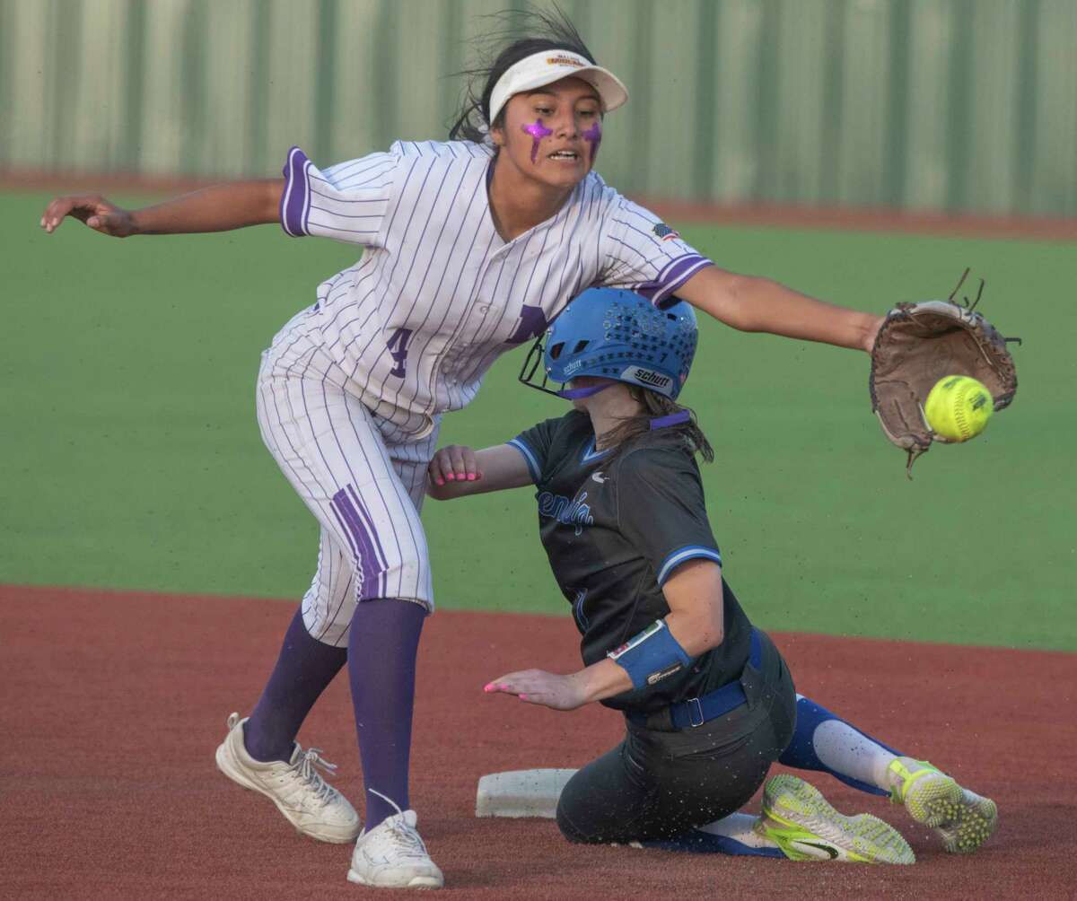 Frenship's Sydnee Bowlin safely steals second as Midland High's Nalaney Paul tries to grab the throw 04/22/2020 at Martin Field. Tim Fischer/Reporter-Telegram