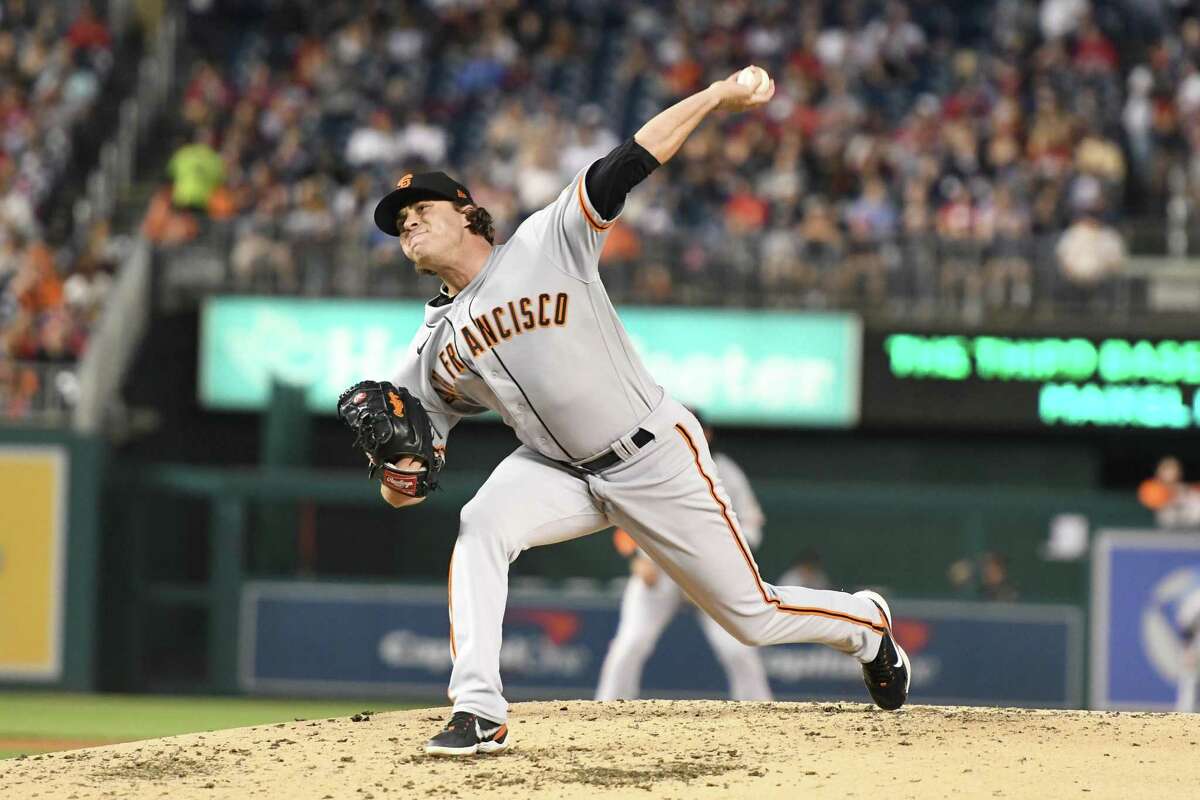 WASHINGTON, DC - APRIL 22: Sam Long #73 of the San Francisco Giants pitches in the second inning during a baseball game against the Washington Nationals at the Nationals Park on April 22, 2022 in Washington, DC. (Photo by Mitchell Layton/Getty Images)