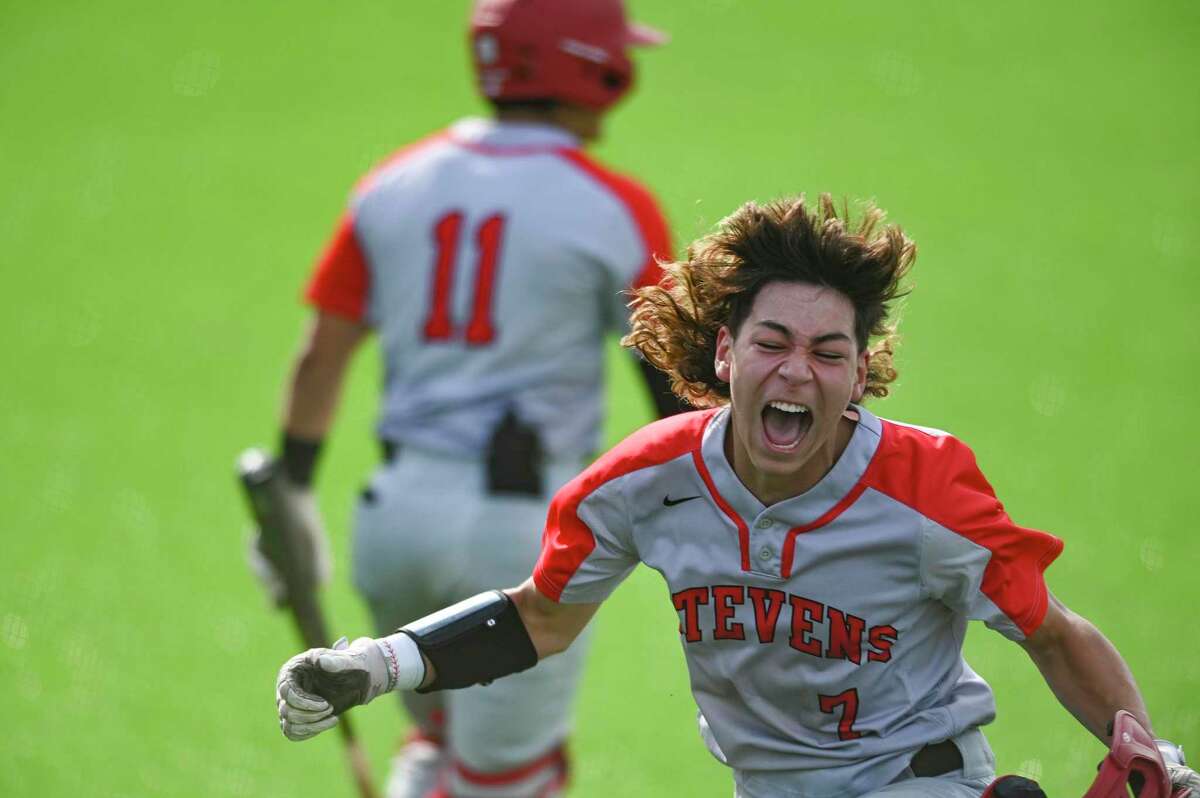 Kevin Brashears of Stevens celebrates after scoring against O’Connor during action at the Northside sports complex on Friday, April 22, 2022. Stevens won the game, 9-0, to win the district championship.