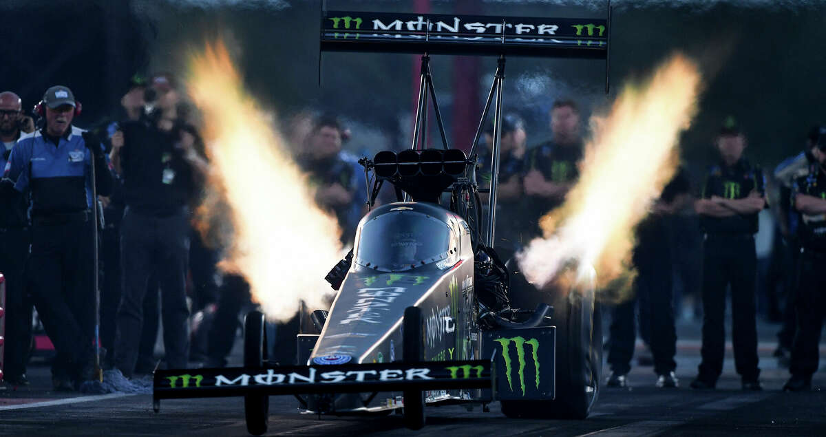 In this photo provided by the NHRA, Brittany Force drives in Top Fuel qualifying Friday, April 22, 2022, during the NHRA SpringNationals drag races at Houston Raceway Park in Baytown, Texas. (Marc Gewertz/NHRA via AP)
