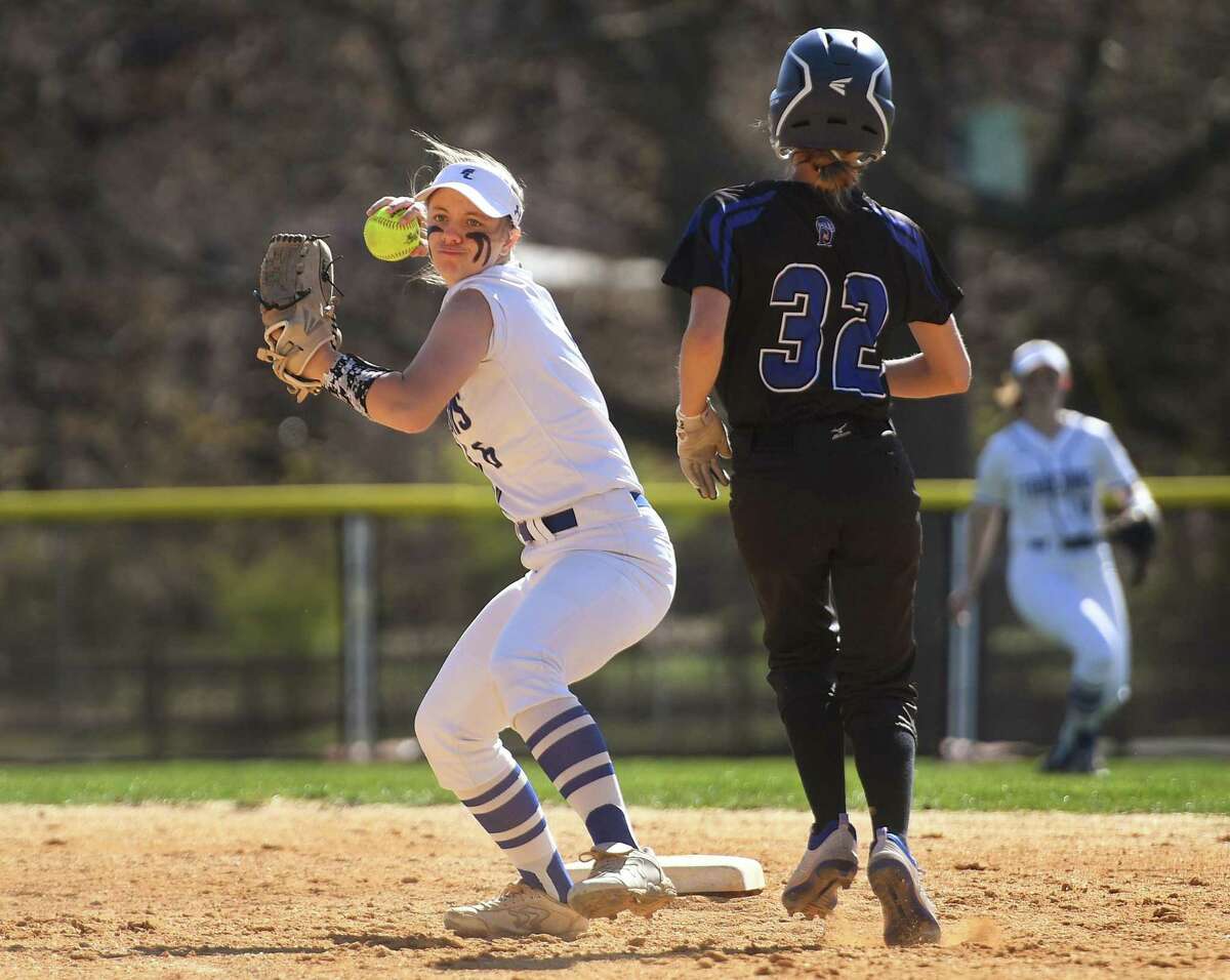 Fairfield Ludlowe's Lauren Foley looks to turn a double play during the first inning of her team's FCIAC girls softbal game with Darien at Sturges Park in Fairfield, Conn., on Friday, April 22, 2022.