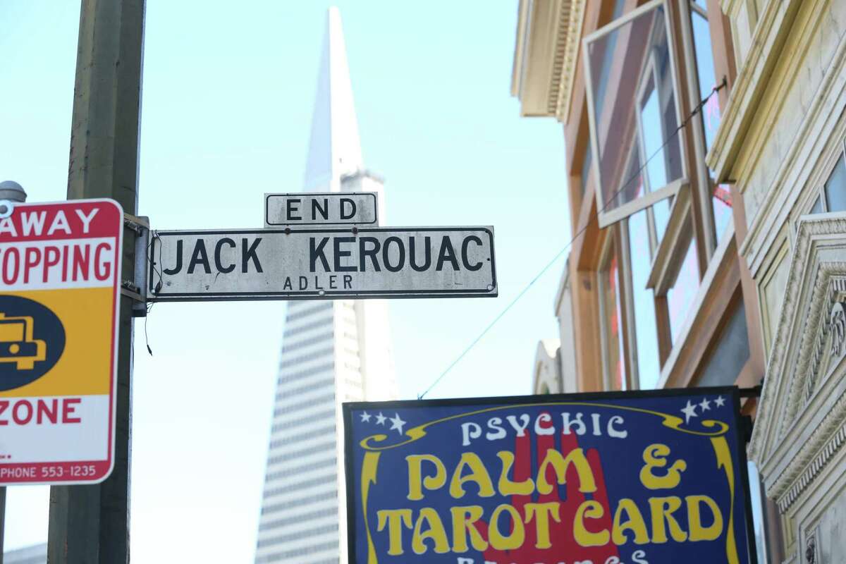 The street sign for Jack Kerouac Alley also has the original street name on it: Adler Place.