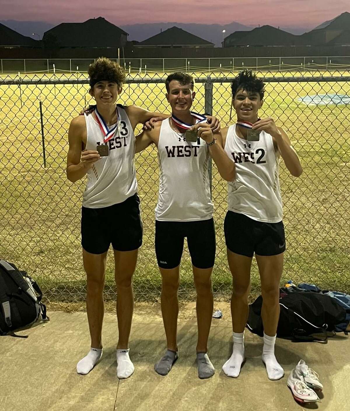 Magnolia West's Owen Maxwell, Joaquin Tello and Brandon Beavers all qualified for regionals during the Area 19/20-5A meet at Katy Paetow High School on Thursday April 21, 2022.