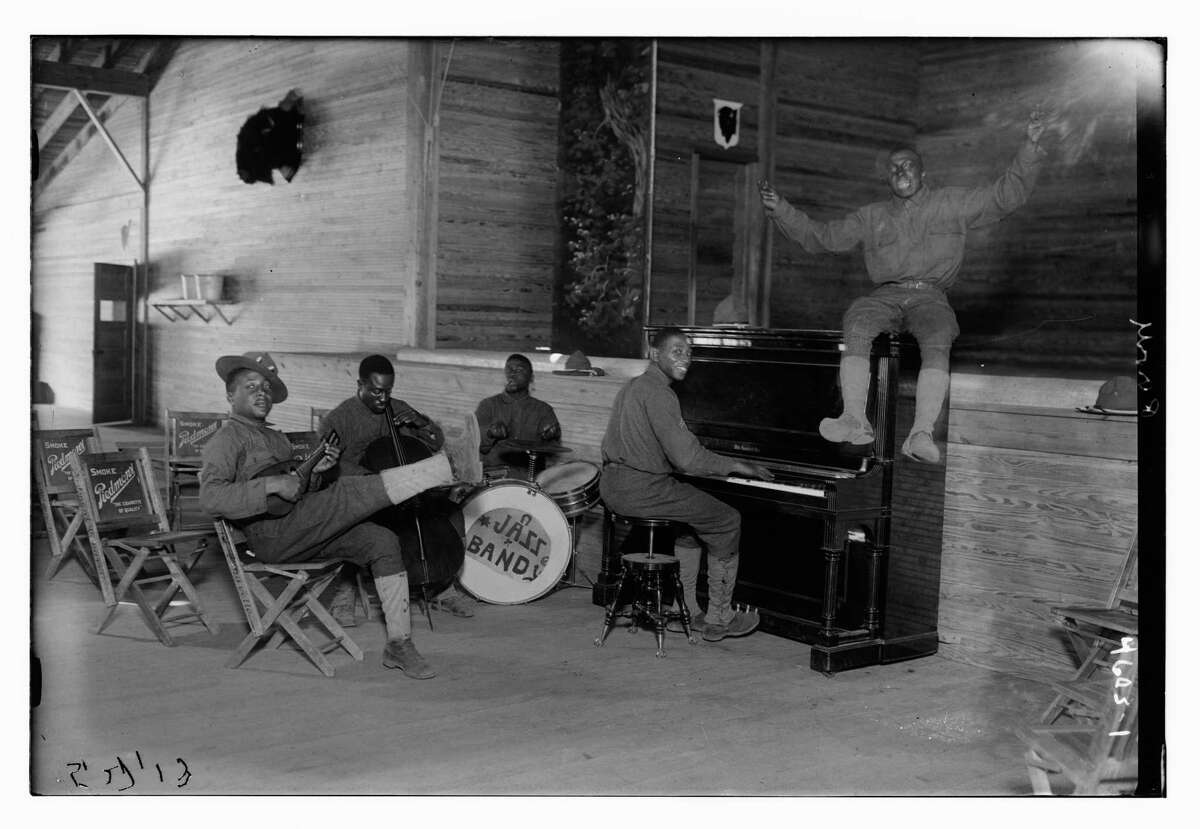 Troops serving with the 165th Depot Brigade at Camp Travis play with a morale-boosting jazz band.