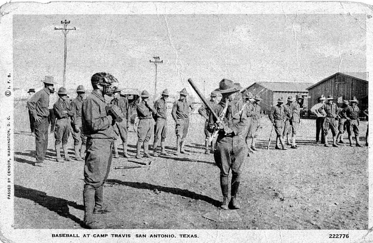 Soldiers play baseball for recreation at Camp Travis, a training center during World War I.