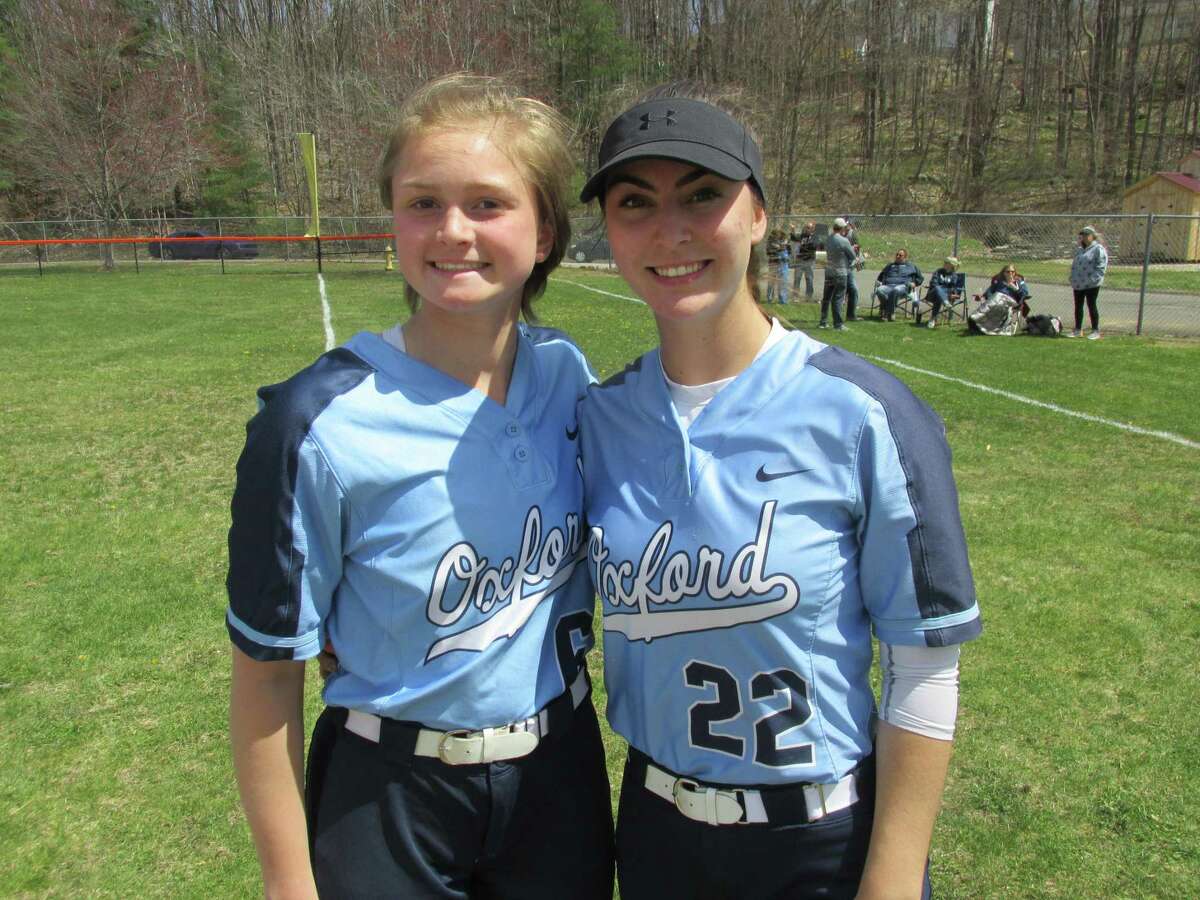 Oxford pitcher Shay Webb, left, and leadoff hitter Rose Renmeyer led the Wolverines to a near-perfect day in a win against Torrington Saturday at Torrington High School.