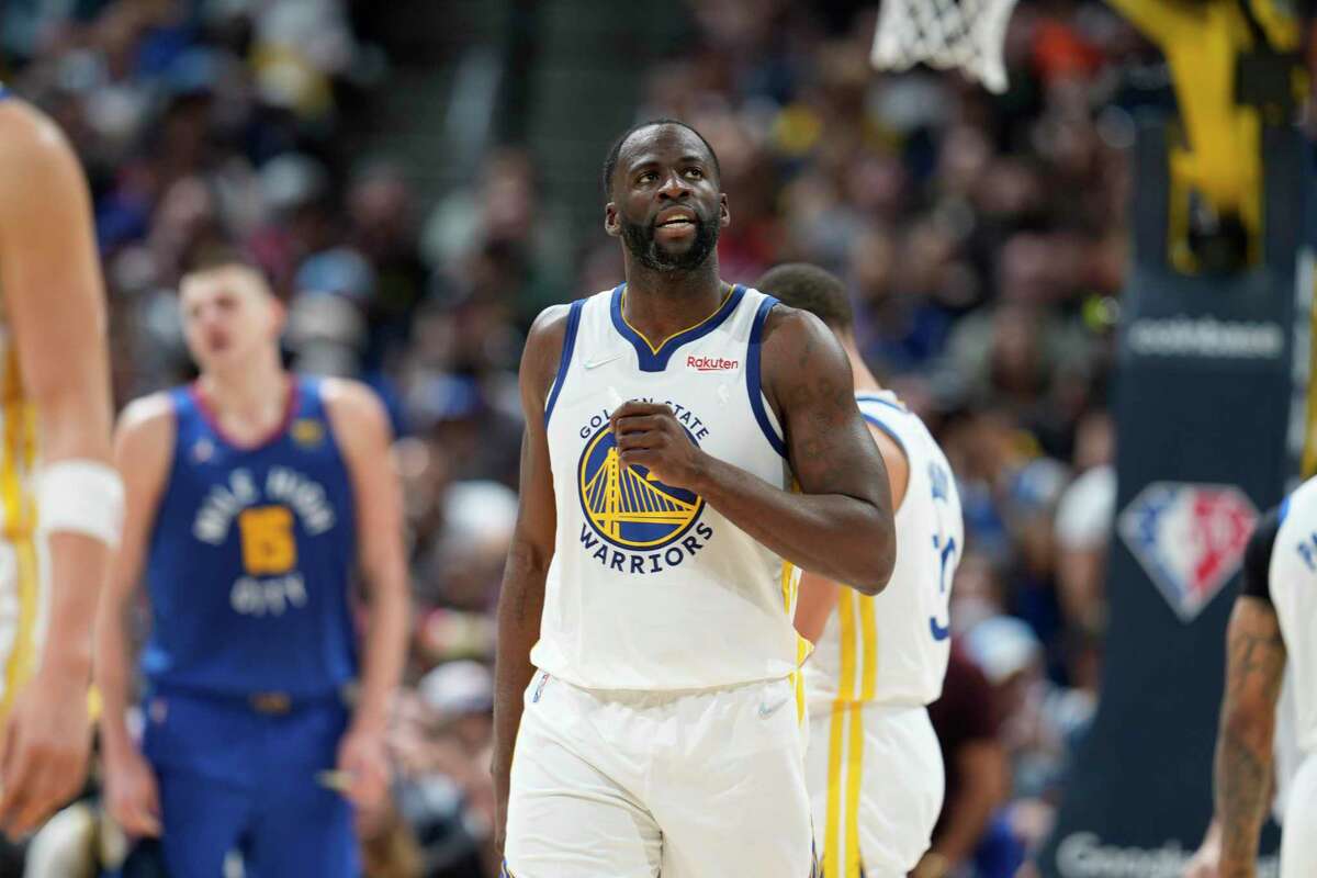 Golden State Warriors forward Draymond Green (23) in the second half of Game 3 of an NBA basketball first-round Western Conference playoff series Thursday, April 21, 2022, in Denver. (AP Photo/David Zalubowski)