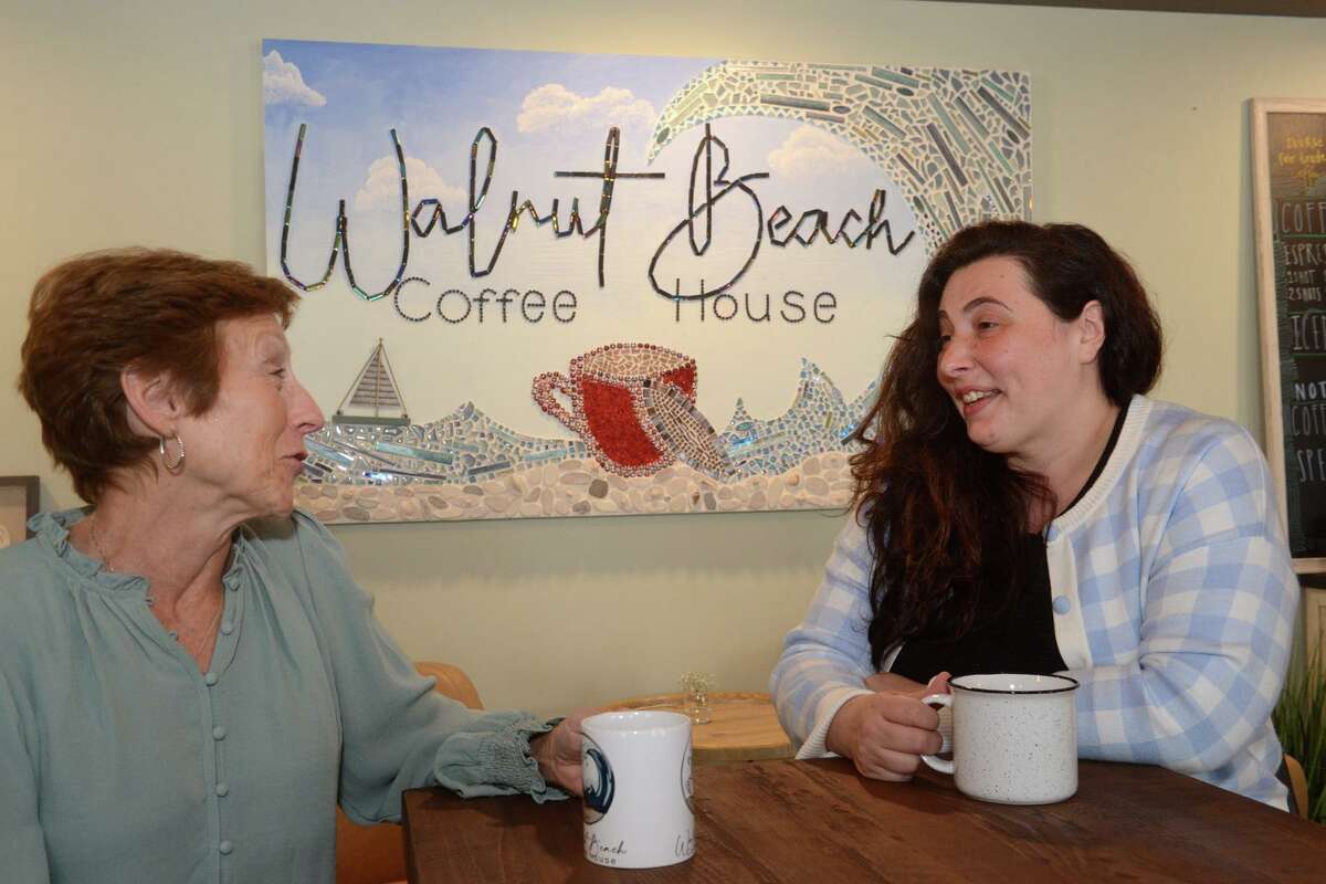 Owners Sue Perkins, left, and Medina Cecunjanin at Walnut Beach Coffee House, in Milford, Conn. April 21, 2022.