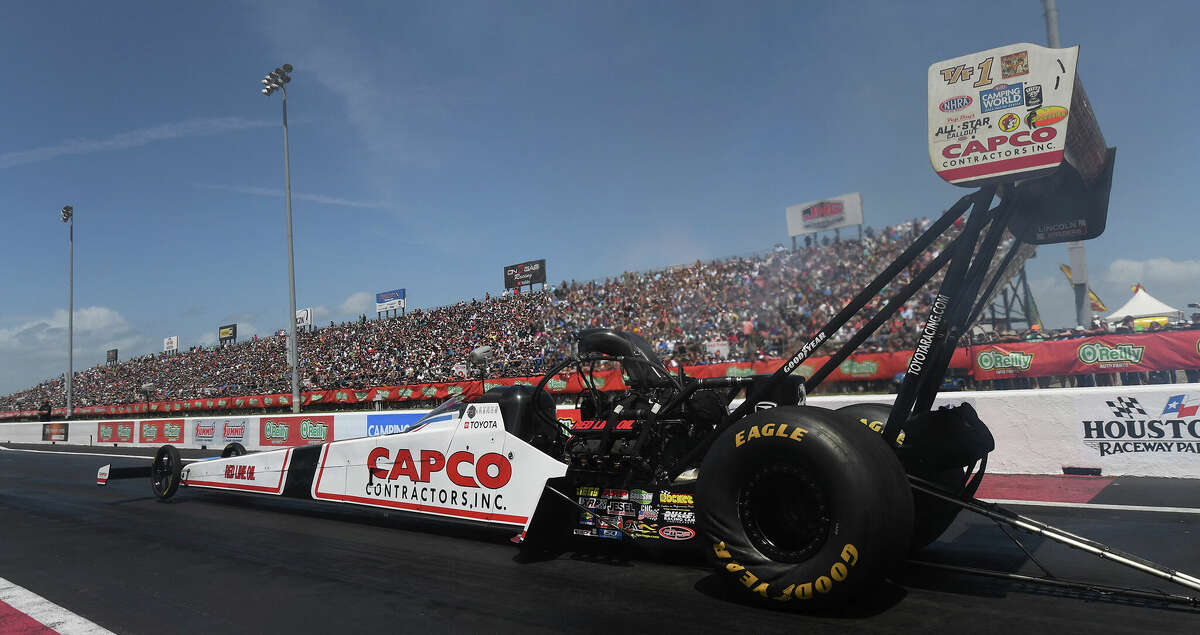 In this photo provided by the NHRA, Steve Torrence takes part in Top Fuel qualifying at the NHRA SpringNationals drag races at Houston Raceway Park on Saturday, April 23, 2022, in Baytown, Texas. (Marc Gewertz/NHRA via AP)