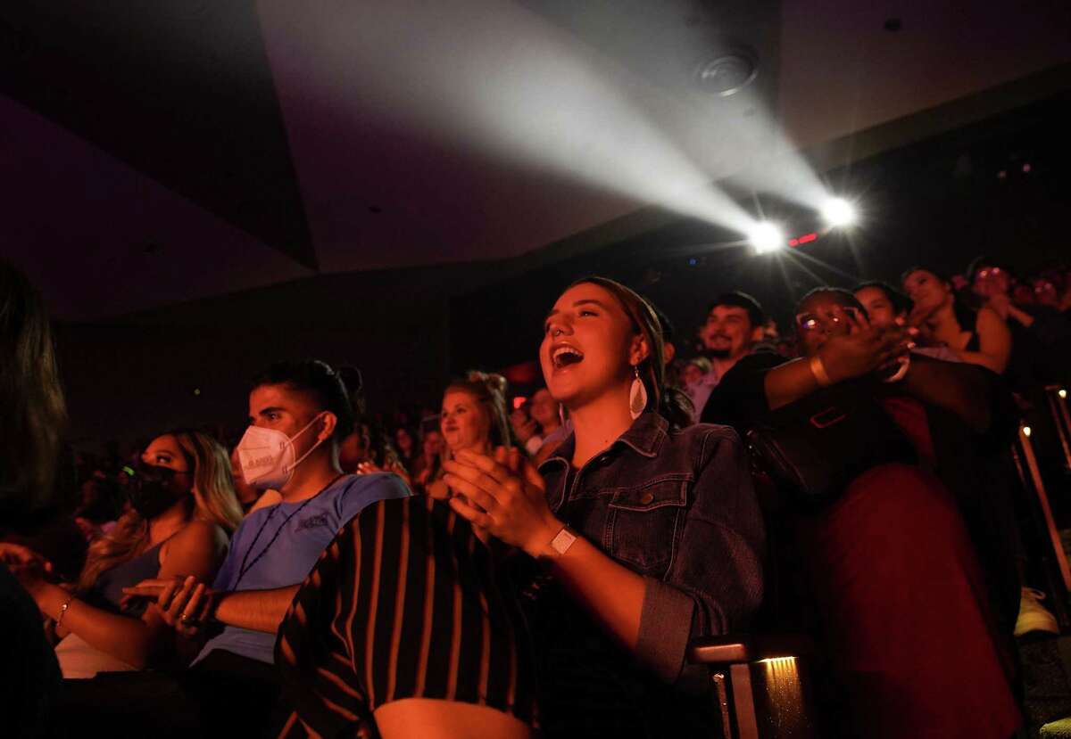 A sold-out audience reacts to a performance during Draggieland at Rudder Theatre at Texas A&M University on Monday, April 18, 2022. A&M pulled funding from an annual drag show on campus, so several LGBT groups banded together over several months to plan and find funding for the event. This is one of several unilateral decisions A&M administrators made this academic year, much to the chagrin of impacted student groups.