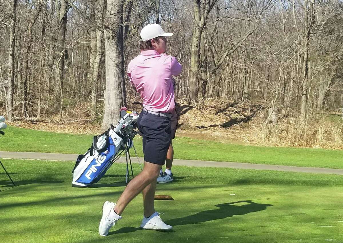 Charlie Duffy from the Fairfield Prep golf team tees off the 12th hole at New Haven Country Club in a scrimmage against Hamden Hall Country Day on April 12, 2022. Duffy is trying to help lead Prep to consecutive SCC and Division I state championships.