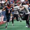Albany Empire receiver/defensive back Antwane Grant stiff arms Carolina Cobras defender Lance Evans during a National Arena League game at the MVP Arena in Albany, NY, on Saturday, April 23, 2022. (Jim Franco/Special to the Times Union)