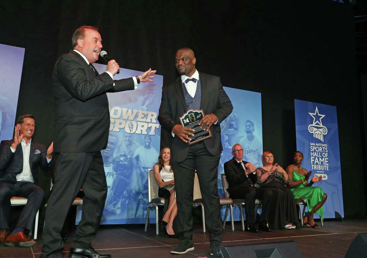 Emcee Dan Harris Don Harris talks with Ndukwe Dike “N.D.” Kalu after receiving his award at the SA Sports Hall of Fame The class of 2022 includes former WNBA San Antonio Stars All-Star Sophia Young-Malcolm, 12-year NFL veteran Ndukwe Dike “N.D.” Kalu, high school football coach George Pasterchick, and Baylor University and Madison alum track All-American Natalie Nalepa at the Henry B. Gonzalez Convention Center on Saturday, April 23, 2022.