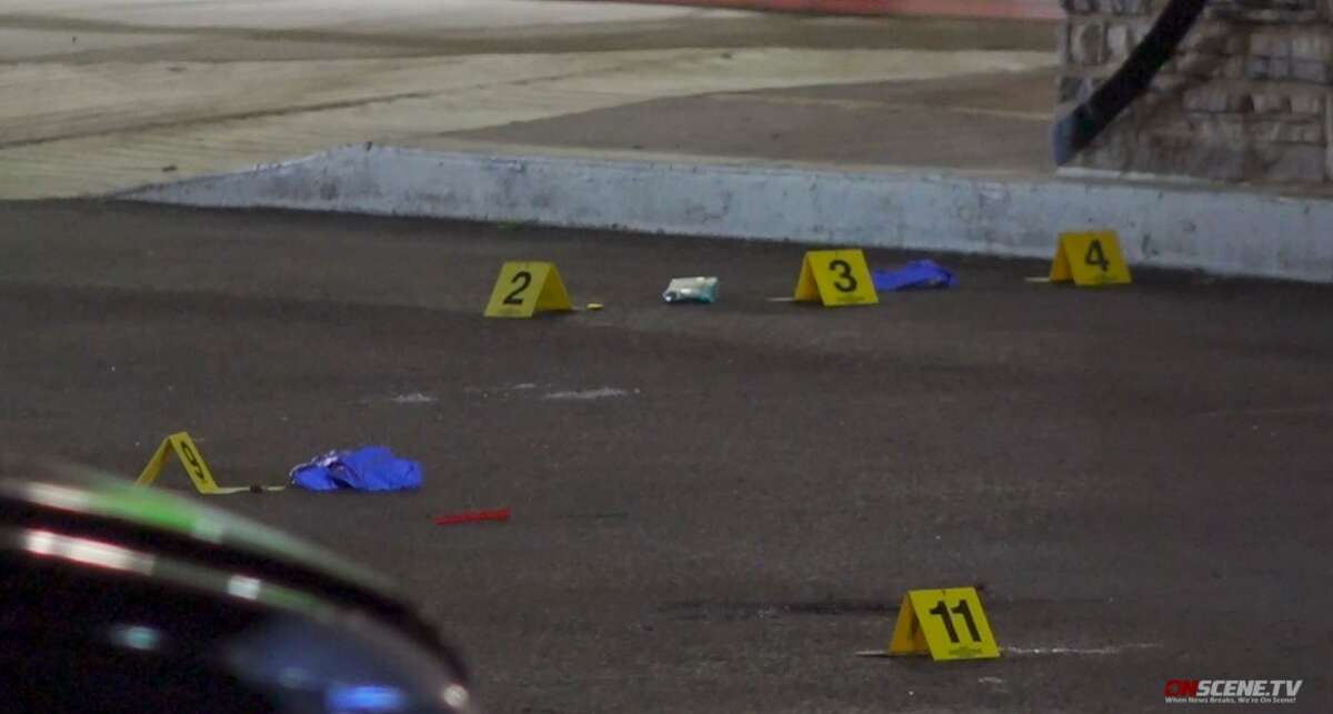 Evidence markers at a crime scene where a man was fatally shot by a security guard April 24, 2022, in the 13700 block of Westheimer Road. 