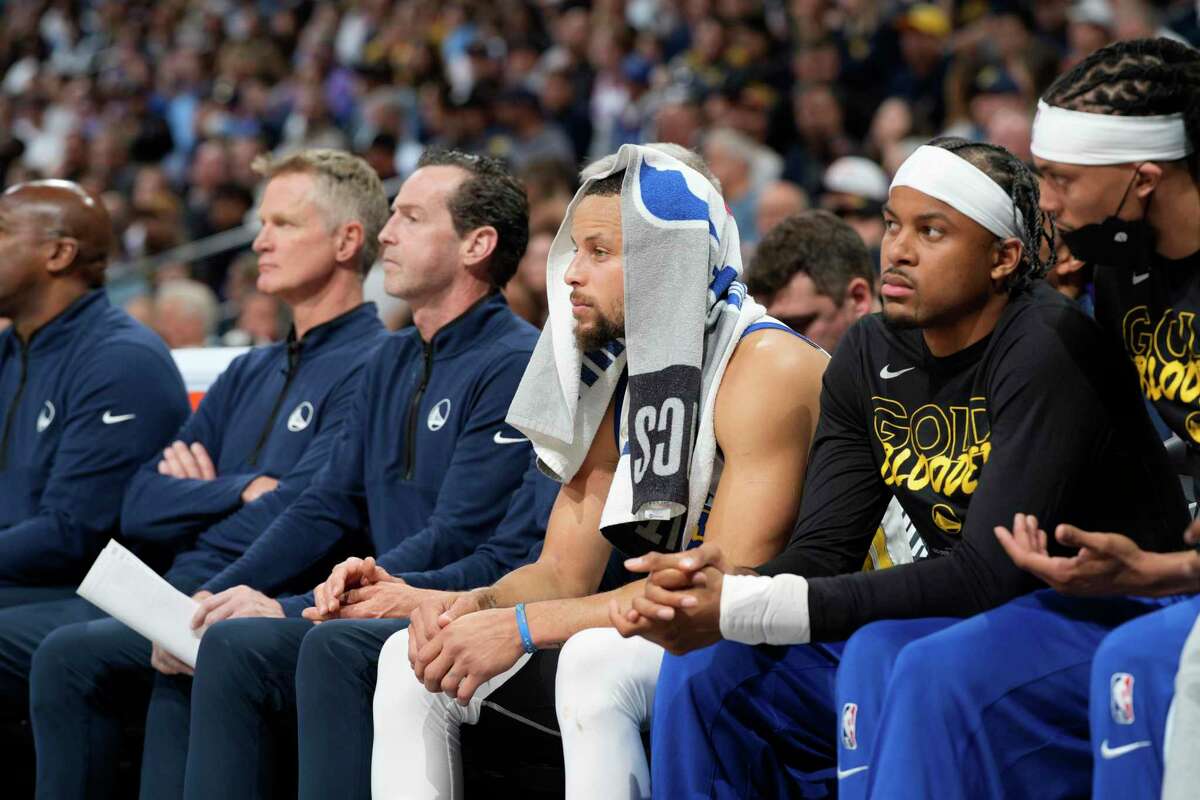 Golden State Warriors guard Stephen Curry (30) in the second half of Game 3 of an NBA basketball first-round Western Conference playoff series Thursday, April 21, 2022, in Denver. (AP Photo/David Zalubowski)