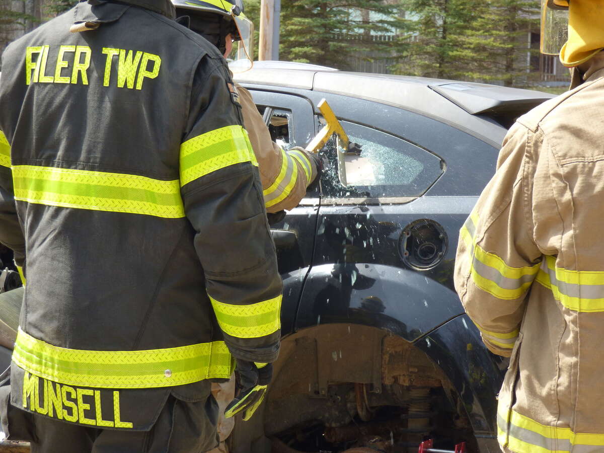 Firefighters crack open cars for auto extrication training