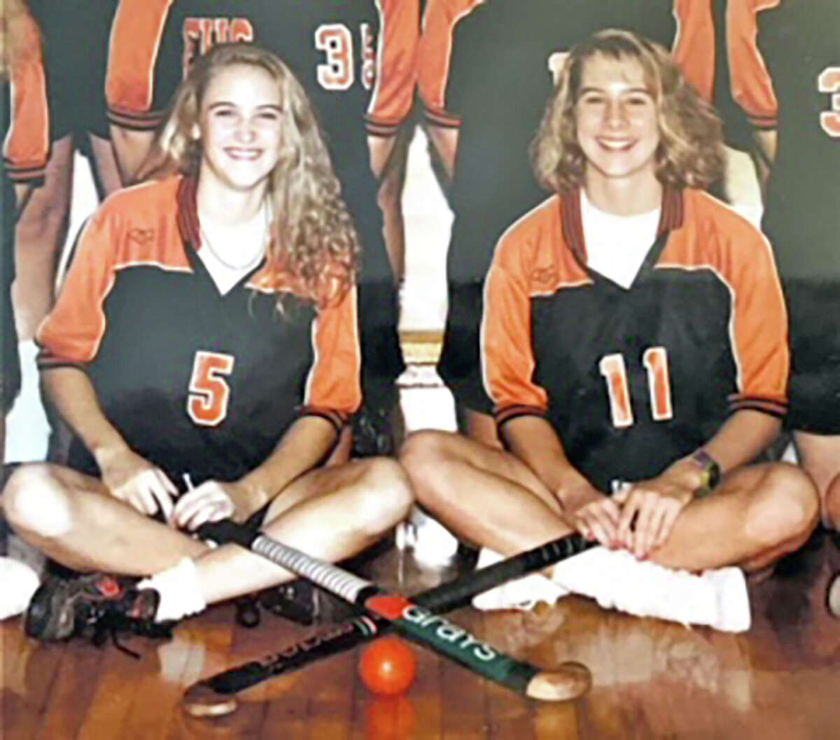 Sisters Kelly Ward, left, and Mary Ward during their field hockey playing days at Edwardsville.