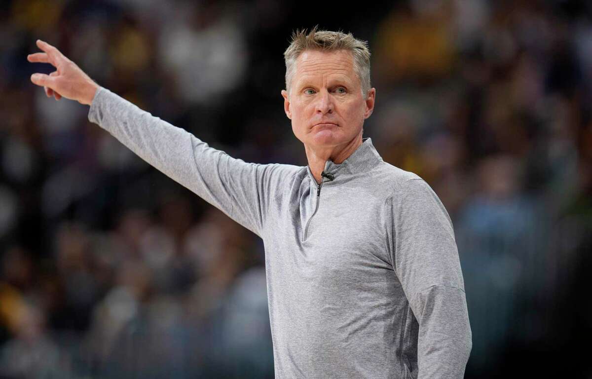 Golden State Warriors head coach Steve Kerr directs his team in the first half of Game 4 of an NBA basketball first-round Western Conference playoff series against the Denver Nuggets, Sunday, April 24, 2022, in Denver. (AP Photo/David Zalubowski)