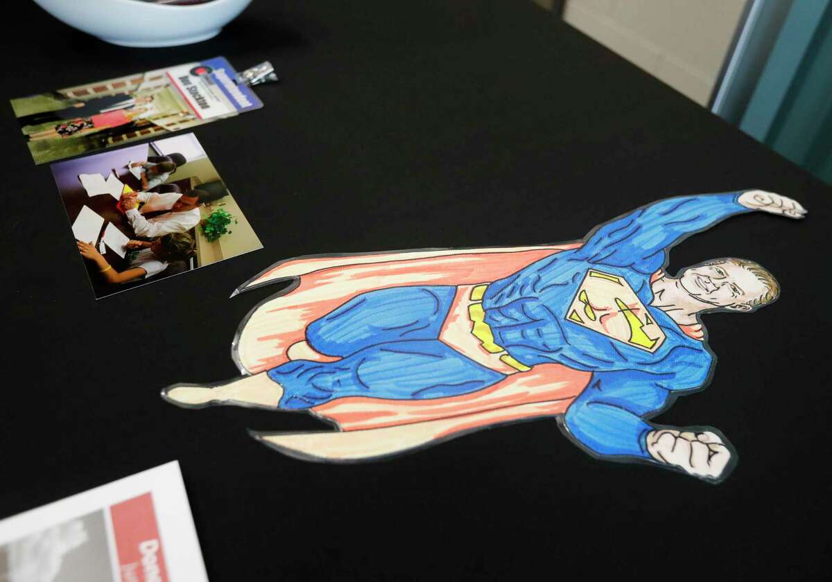 A drawing of former Conroe ISD Superintendent Don Stockton as Superman is seen as Conroe ISD marked the opening of Stockton Junior High School during a dedication ceremony, Saturday, April 23, 2022, in Conroe.